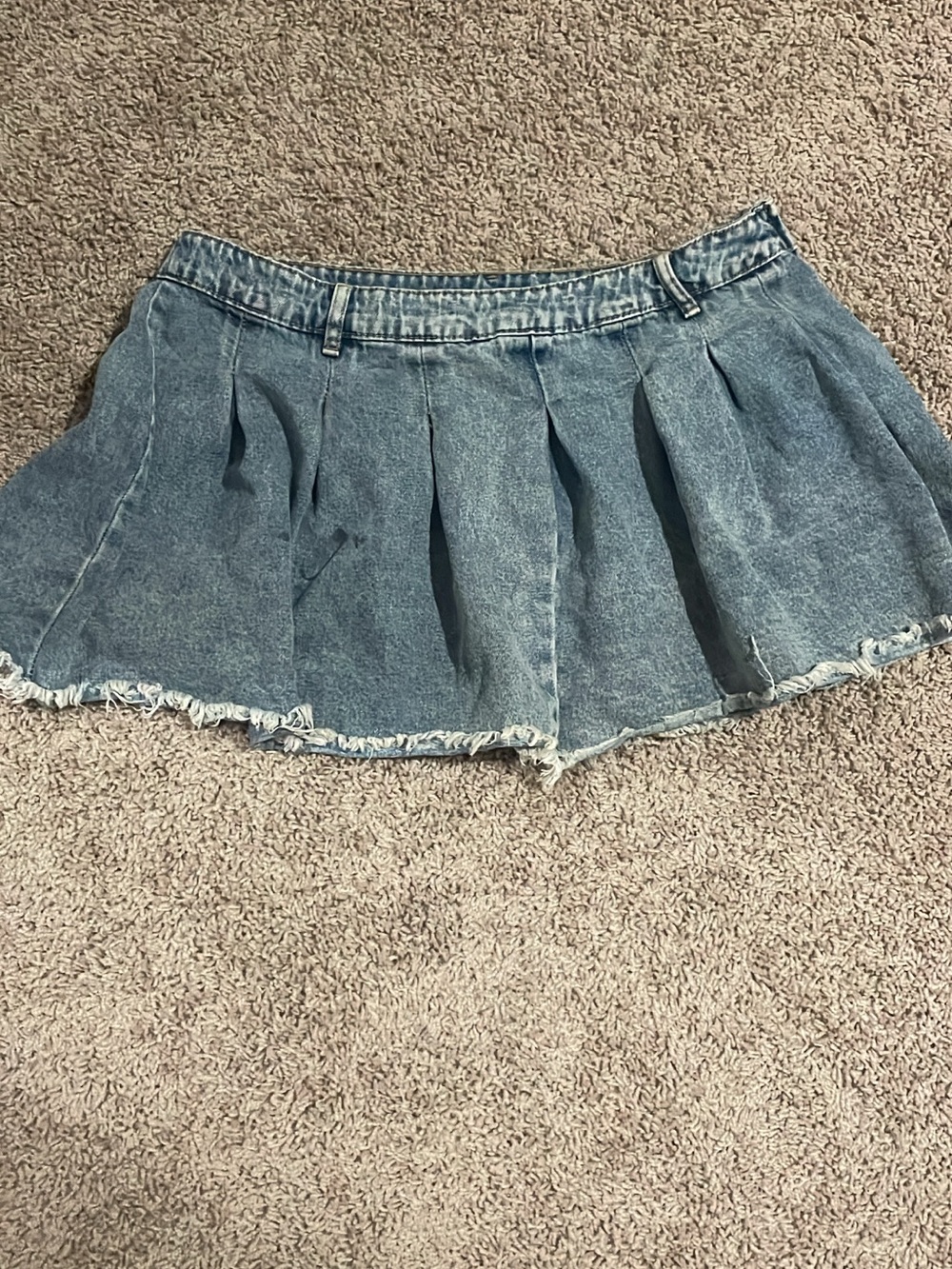 Denim Pleated Mini Skirt with Frayed Hem